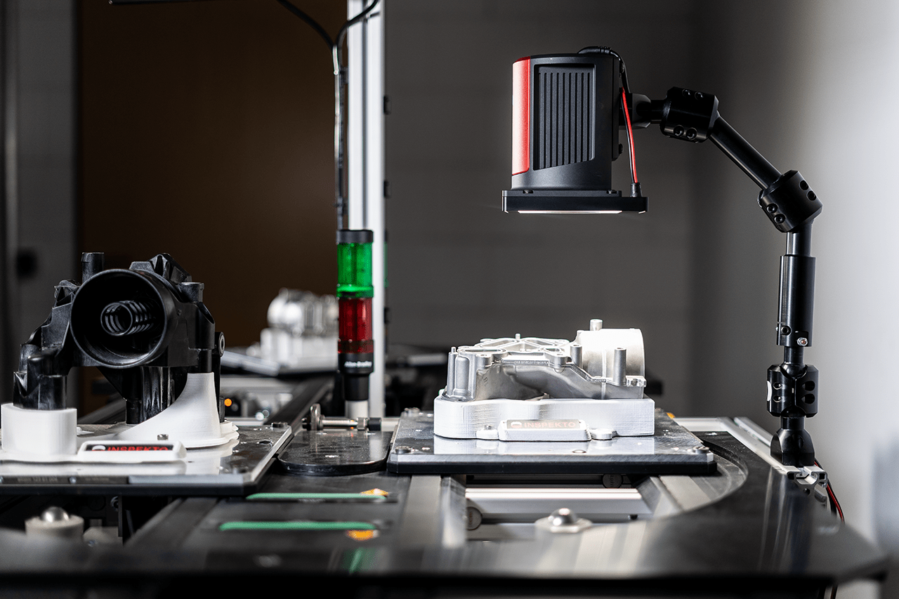 "Inspekto Computer Vision System inspecting metal part"